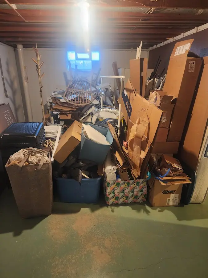 Roll-off dumpster container at job site for 15 Yard Dumpster Rental in Valley Stream